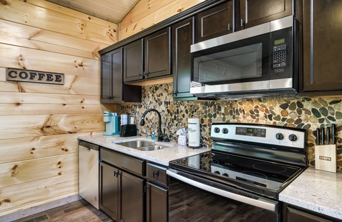 Sevierville Cabin | Newly Built Cabin! Hot Tub! Foosball! 5 MI to Pigeon Forge! Mountain Views!