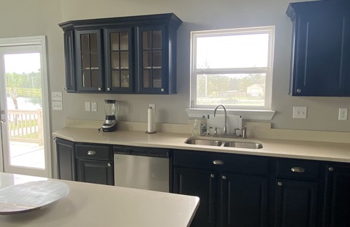 Saucier House | Newly remodeled house on the lake! Private beach! Near the Gulf of Mexico