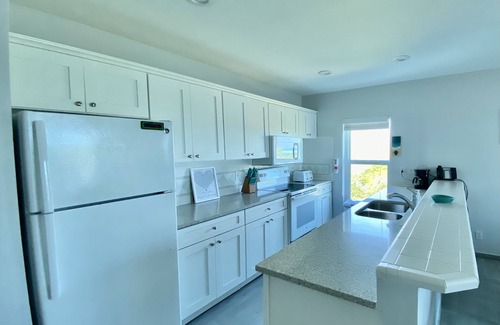 Wheeland Settlement Condo | Newly Renovated Penthouse: Peace, Love, and the Beach Await YounBest View NWP