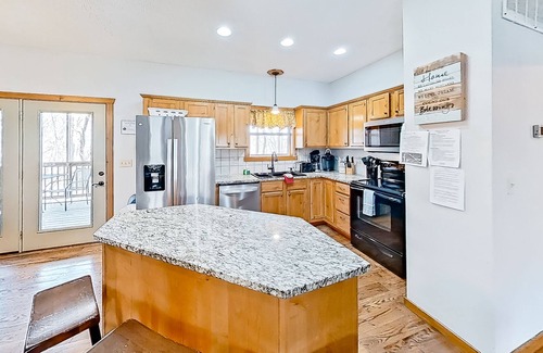 Indian Point Cottage | Newly renovated home with fantastic game room, fireplace, pool & hot tub