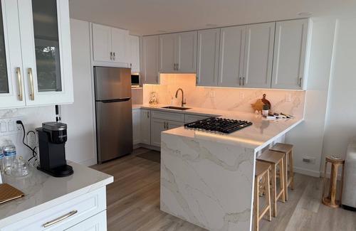 Punaluu Condo | Newly renovated, oceanfront, AC, beautiful views, steps to secluded beach