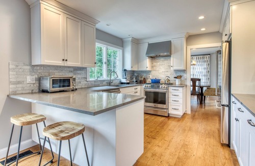 Greenport West House | Newly Renovated Summer Retreat, Heated Pool, Walk to Beach, Designer Furnishings