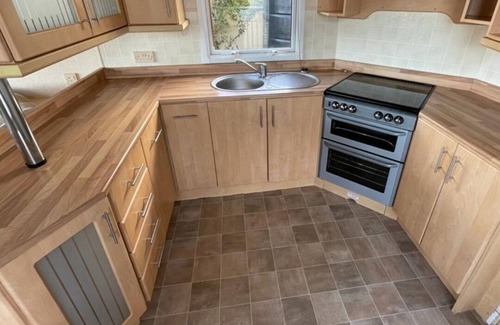 Llanllwchaiarn Cabin | NEWQUAY WALES sleeps 6 people at ocean heights site.with heated pools also bars.