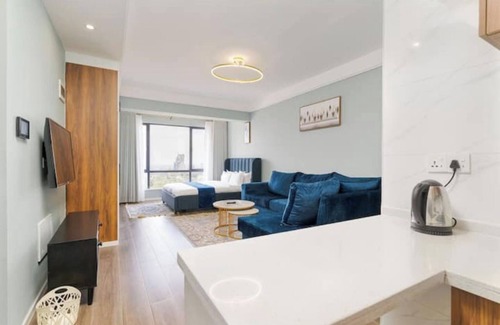 Kilimani Apartment | Ngong Hills Views from the City Center/Pool/Gym