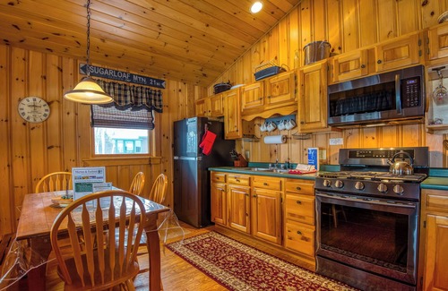 Rangeley Plantation Cabin | Niboban Cabin 5 right on Rangeley Lake with a screened porch, fire pit, hammock, WiFi and dock!