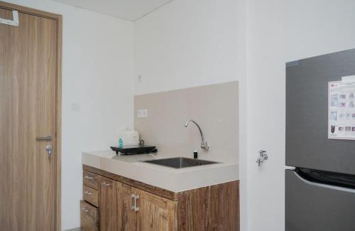 Pondok Aren Apartment | Nice and Homey Studio at Bintaro Embarcadero Apartment By Travelio