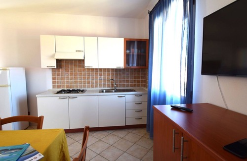 Northern Sardinia Apartment | Nice apartment for 4 guests with pool, WIFI, TV and balcony, close to Castelsardo