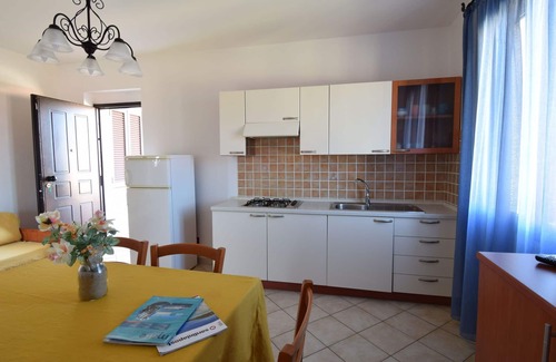 Northern Sardinia Apartment | Nice apartment for 4 guests with pool, WIFI, TV and balcony, close to Castelsardo