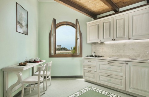 Bosa Marina Apartment | Nice apartment on the ground floor with sea view of about 45 m2 equipped with air conditioning and wi fi connection, composed of a living room with equipped kitchenette, fridge and flat-screen television.It can be on one level or with a mezzanineA double