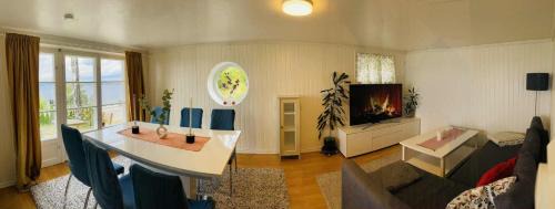 Oslo Apartment | Nice Family Friendly apartment 2 bed Rooms with sea view located in Nordstrand for 5 guests with a garden and grill with sea view just beside the apartment