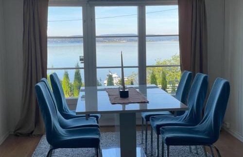Oslo Apartment | Nice Family Friendly apartment 2 bed Rooms with sea view located in Nordstrand for 5 guests with a garden and grill with sea view just beside the apartment