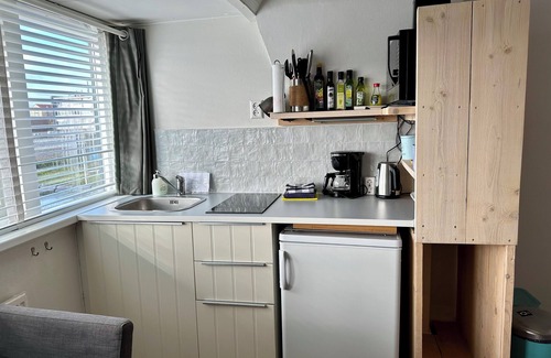 Bergen aan Zee Apartment | Nice studio with small terrace and parking lot. Only 200 meters from the sandy beach