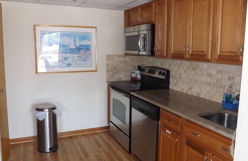 Avalon Condo | Nicely appointed one bedroom air conditioned Merrimack Condominium offering beachblock location