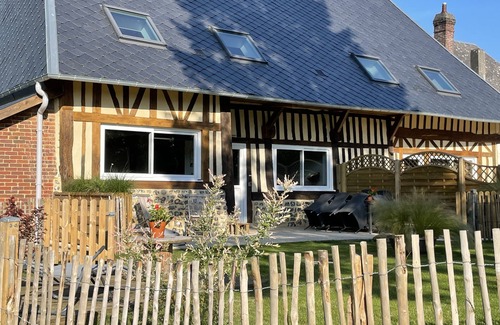 Melamare House | Norman house in enclosed hovel with garden