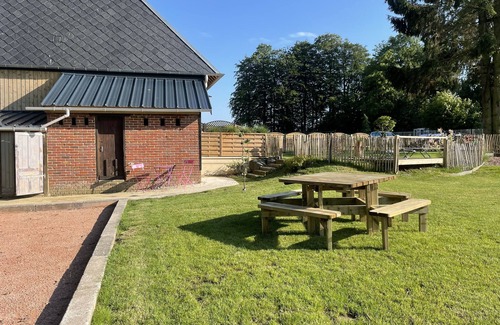 Melamare House | Norman house in enclosed hovel with garden