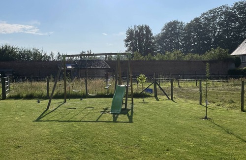 Melamare House | Norman house in enclosed hovel with garden