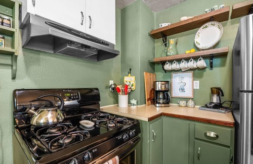 Sunset House | North End Charm: Cozy Cottage with Fireplace, 2 Bikes, Tree Swing, and a Dog-Friendly Fenced Yard!