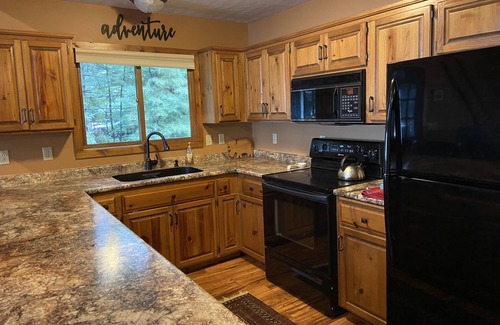 Stone Lake Cabin | Northwoods lakeside family-friendly cabin. Amazing sunsets! Nice sandy beach.