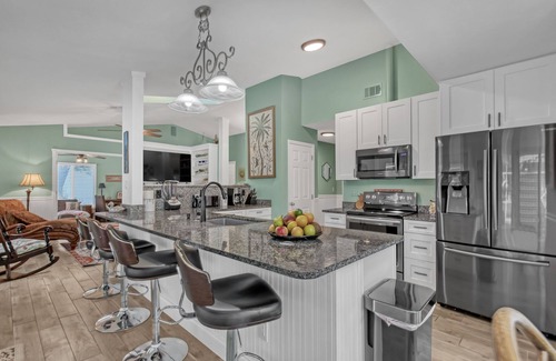 Sebastian Highlands House | Oasis with Heated Saltwater Pool, Pond with Ducks & Koi, Large Yard & King Suite