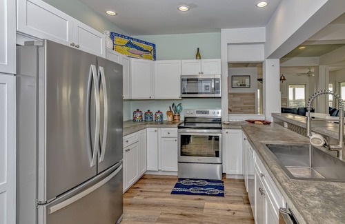 Flora's Bluff House | Ocean front home, access to both clubs and large porches! Breaking Point