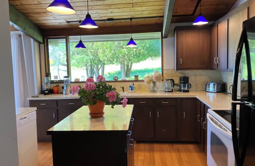 Surry House | Oceanfront 1980's Contemporary . Serene. Pet friendly. Private beach. Sleeps 4.