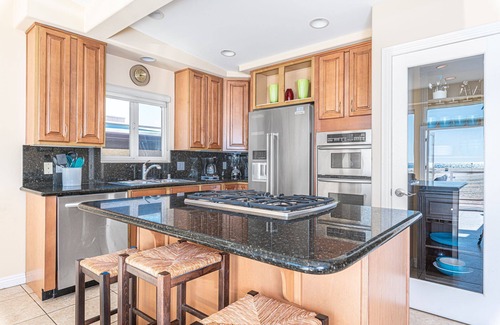 Balboa Peninsula Condo | Oceanfront 5BR Home with Spacious Balcony & Patio, Right on the Boardwalk!