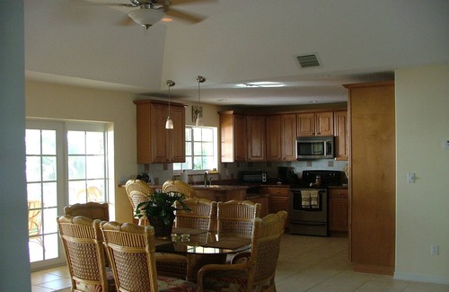 Breezeswept Beach Estates House | Oceanfront Rental With Heated Pool, Dock & Tiki Hut