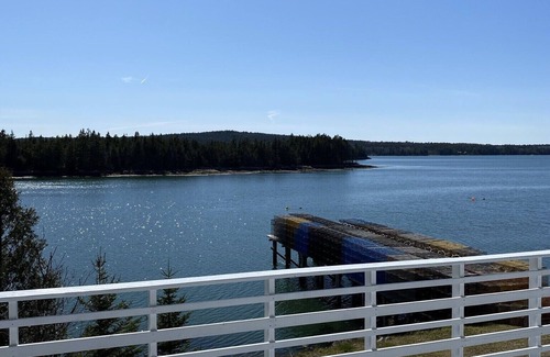 Steuben Cottage | Oceanfront Retreat on Dyers Bay With Amazing Sunsets! Fishing off dock