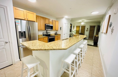 Mexico Beach Condo | OceanView Condo with Pool and Hot Tub