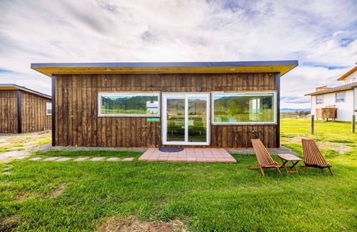 Whitehall Cottage | Off-grid tiny home in apple orchard with million-dollar mountain views!