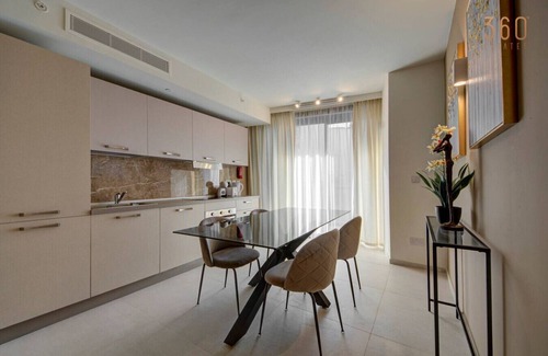 Paceville Apartment | Official Mercury Suites: Stylish 2BR with Terrace