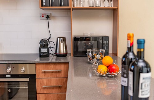 Blantyre Apartment | Oh wine at Lucas place