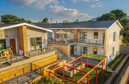 Blantyre Apartment | Oh wine at Lucas place