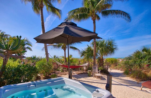 Wulfert Cottage | Old Florida Beach Cottage, ON the beach, Pet Friendly, stargaze in the hammock