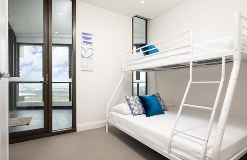 Sydney Olympic Park Apartment | Olympic Park central location, high level, full City view,