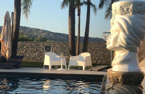 Floridia Villa | Orange house with large park and swimming pool.