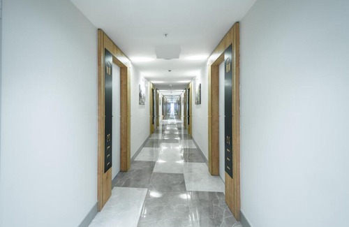 New Boulevard Apartment | Orbi City Aparthotel With Sea View