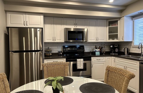 Maple Ridge House | Our BEAUTIFUL 2 Bedroom DELUXE Basement Suite w/AC & NG fireplace, Kanaka Ridge