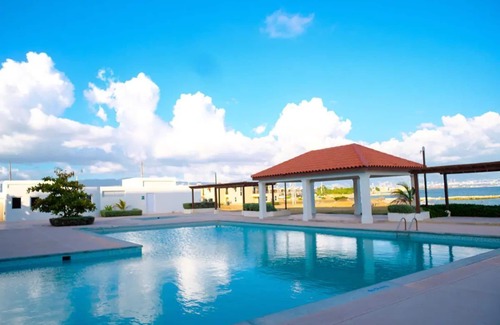 Portmore Apartment | Our beautiful property boast a swimming pool, private beach , basketball court .
