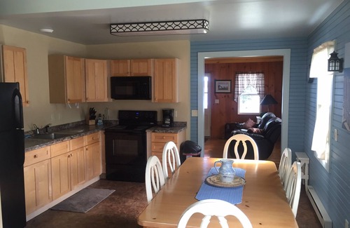 Auburn Cottage | Owasco Lake front seasonal cottage with level yard and beach