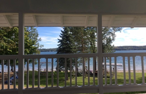Auburn Cottage | Owasco Lake front seasonal cottage with level yard and beach