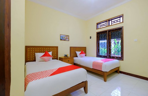 Mangsit Hotel | OYO 2864 Mangsit Garden Homestay