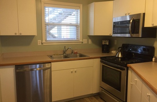 Colington Condo | Oyster Pointe Soundside Large Deck Overlooks Pool