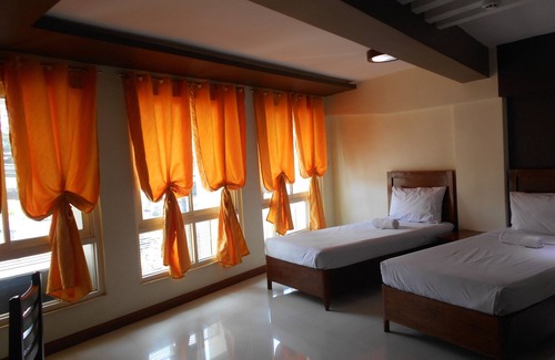 Puerto Princesa City Centre Hotel | Palawan Palm Suites