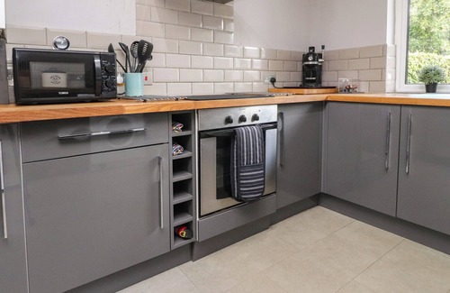 Burton Cottage | PALM COURT, pet friendly, with a garden in Burton-In-Kendal