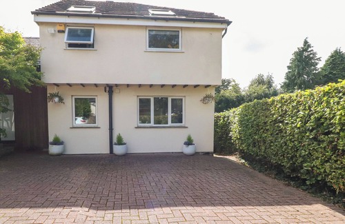 Burton Cottage | PALM COURT, pet friendly, with a garden in Burton-In-Kendal