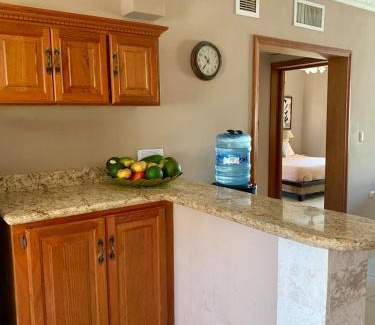 El Cortecito Apartment | Palm Suites E-6-two-level apartment with a view of the pool