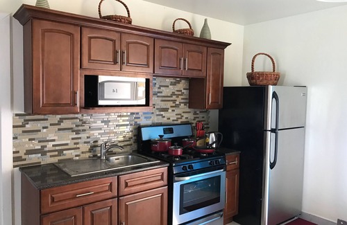 Dickenson Bay Condo | Paradise beach front condo with stunning views. (Flexible cancellations)