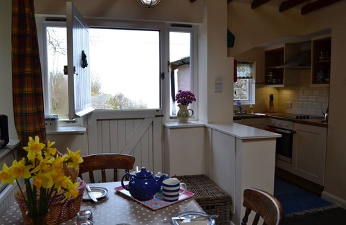 Culbone Cottage | Parsonage Farm Stables, with stunning views down to the sea