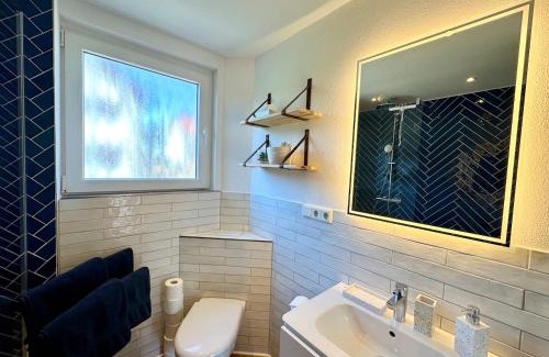 Braunlage Apartment | Pavillon Am Kurpark - Top bewertet von Familien! Zentral, modern, ruhig - mit Balkon, Grill, Parkplatz, Wallbox und inklusive Wäschepaket